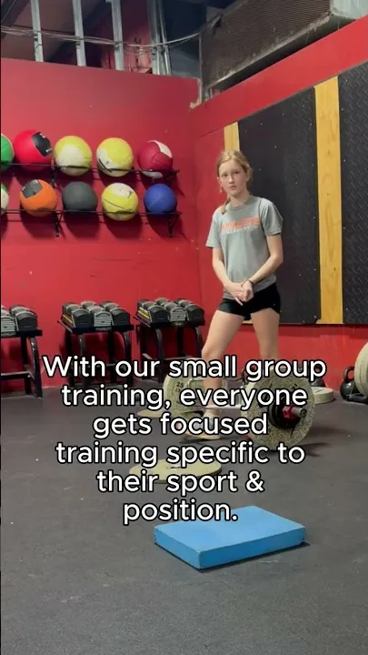Young basketball player Gwen training in the gym